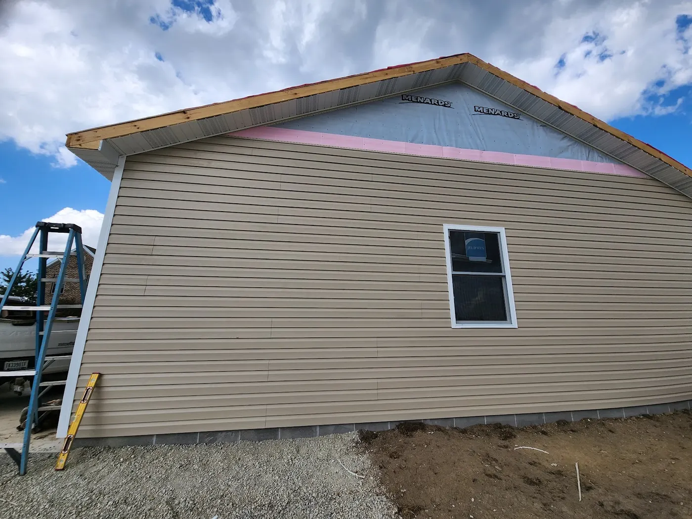 New siding wrapped and finished — Helpful Home Solutions