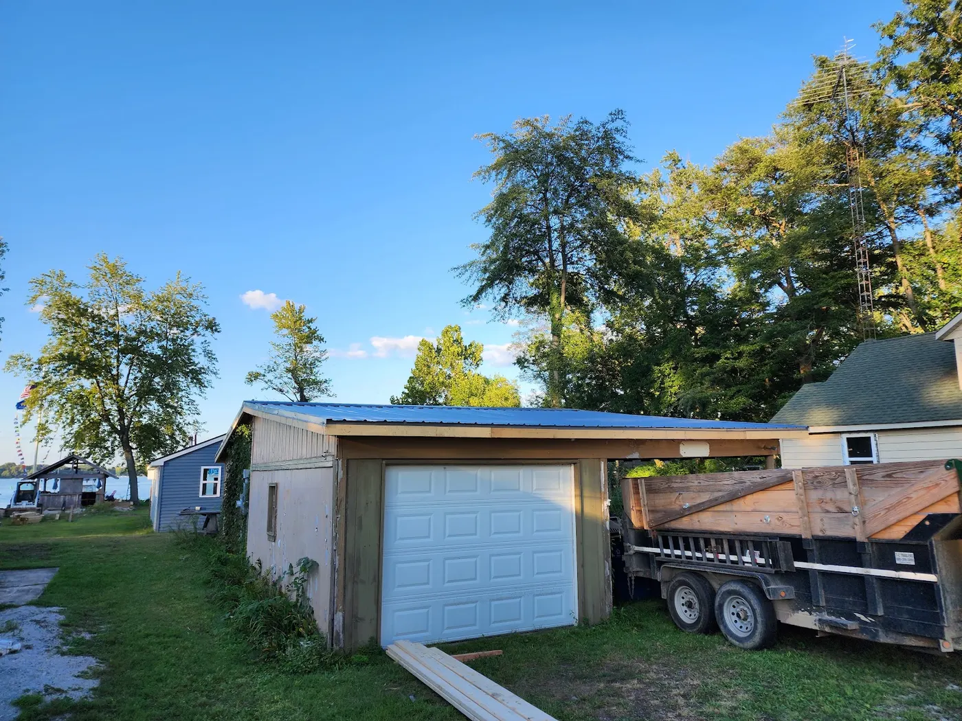 Garage with new metal roof — Helpful Home Solutions
