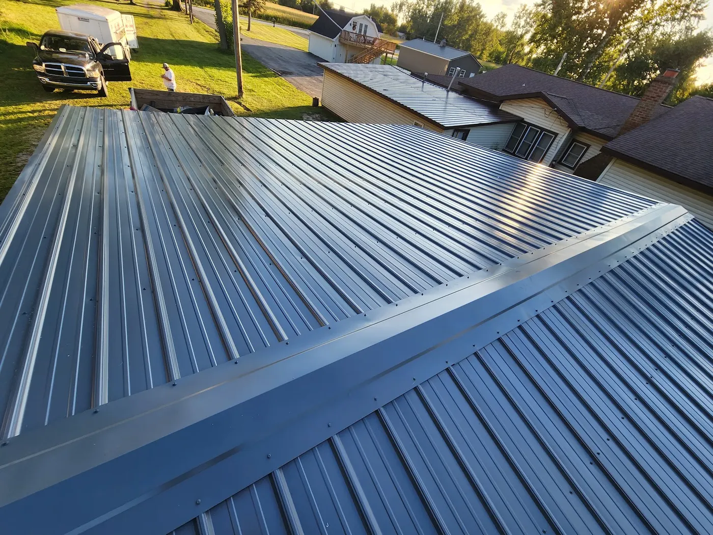 Metal roof on the lake — Helpful Home Solutions