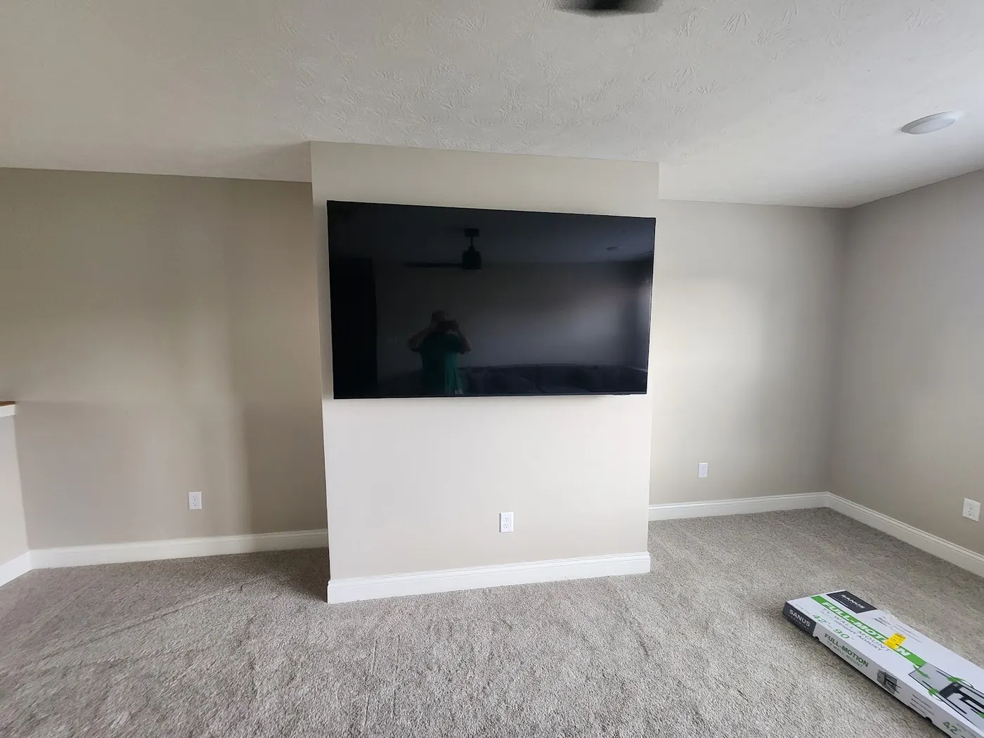 Media wall and mounted TV — Helpful Home Solutions