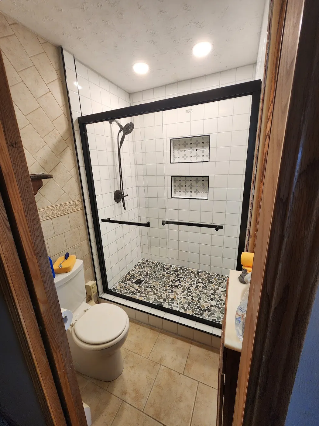 Tile shower with glass slider — Helpful Home Solutions